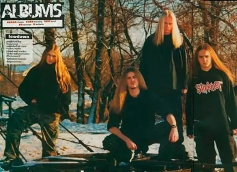 Early days of Decapitated, featuring the original lineup with long hair, standing in a snowy outdoor setting.